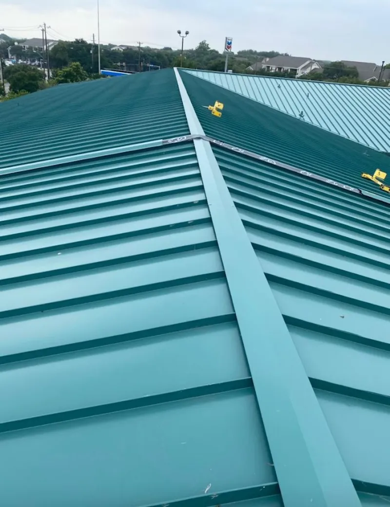 Green commercial metal roof ridge and valley for Metal Roof Repair in McPherson