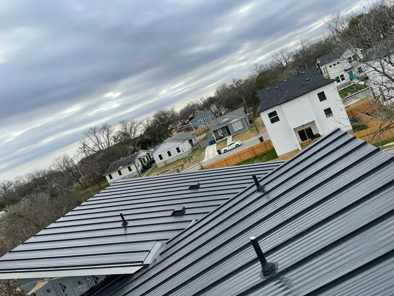 Standing seam metal roof panels with vents for Skylight Repair in McPherson